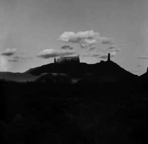A black and white photo of some mountains