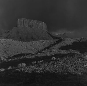 A black and white photo of a mountain range.