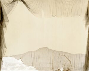 A white sheet with some brown lines on it