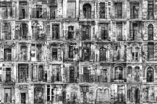 A black and white photo of many windows.