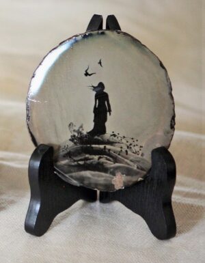 A plate with a picture of a person on it