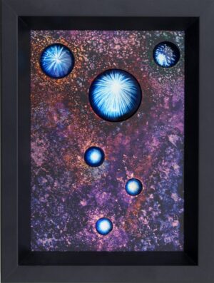 A painting of blue planets in the sky.