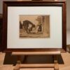 A picture of an old painting on display.