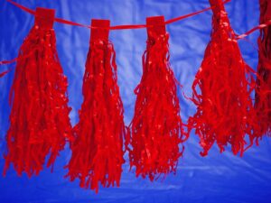 A string of red streamers hanging from the ceiling.