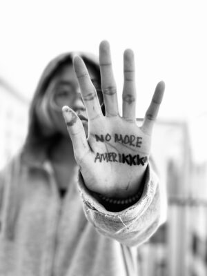 A person with their hand up in the air
