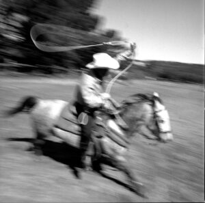 A man riding on the back of a horse.