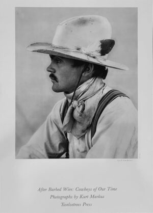 A man in a hat and tie with suspenders.