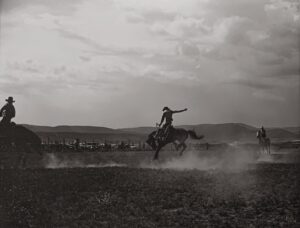 A man riding on the back of a horse.