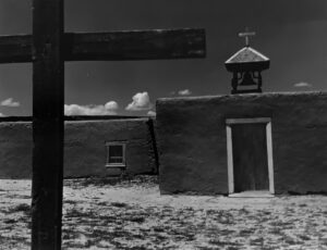 A black and white photo of an old church