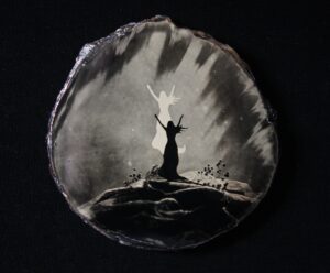 A painting of a person standing on top of a rock.