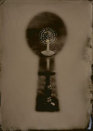 A black and white photo of a bathroom sink.