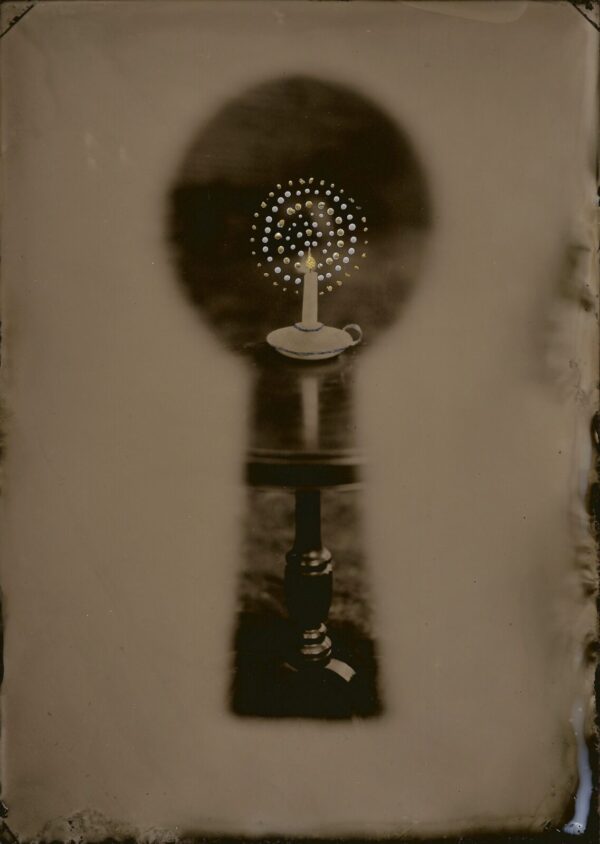 A black and white photo of a bathroom sink.