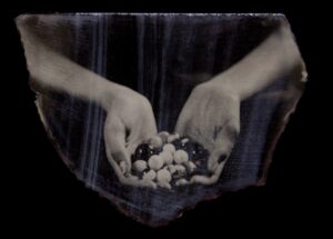 A person holding a bowl of food in their hands.