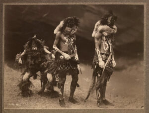 A group of native americans standing next to each other.