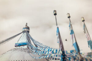 A view of some flags and lights on the roof.