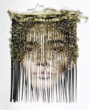 A woman 's face is made up of many strands.