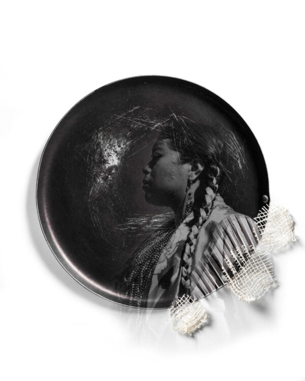 A black plate with some hair in it