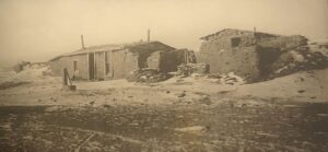 A black and white photo of an old building.