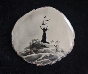 A painting of a person on top of a rock.