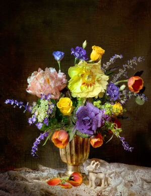 A vase filled with flowers on top of a table.