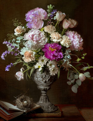 A vase of flowers on top of a table.