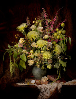 A vase of flowers on top of a table.
