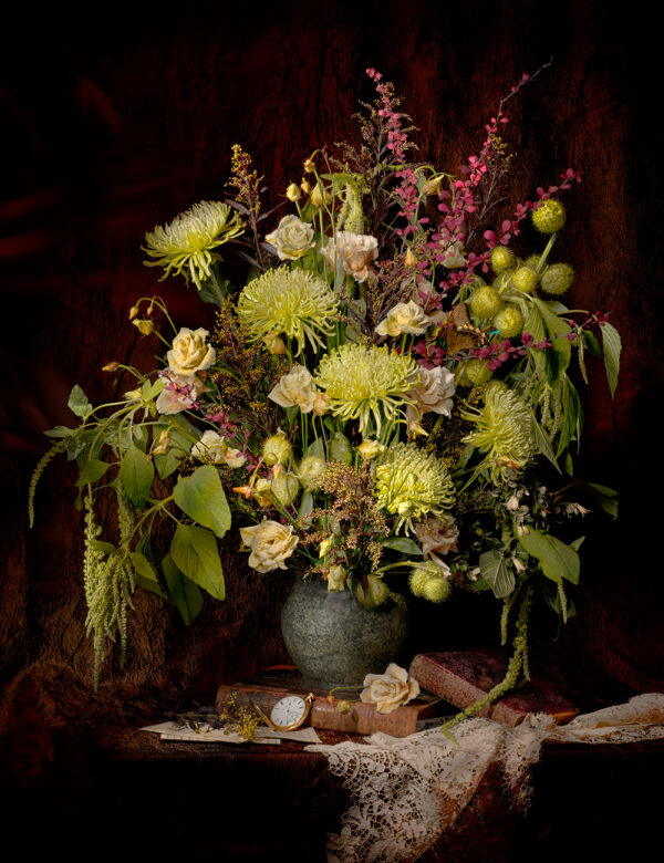 A vase of flowers on top of a table.