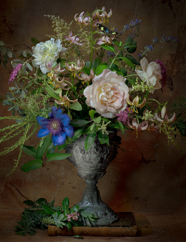 A vase filled with flowers on top of a table.