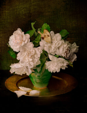 A painting of white flowers in a green vase.