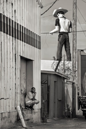 A man standing on top of a building.
