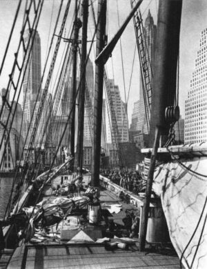 A black and white photo of the rigging on a ship.