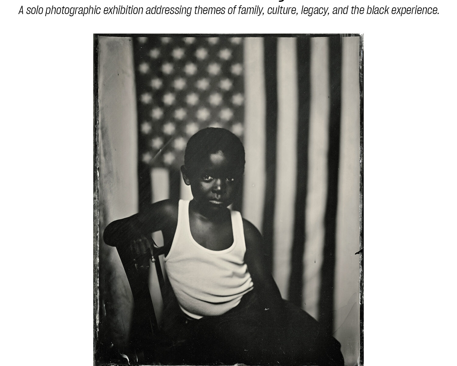 Child portrait against an American flag backdrop.