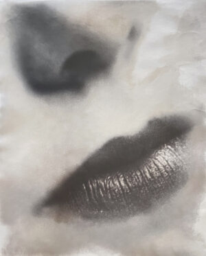 A close up of the lips and eye area