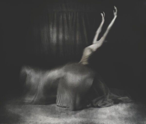 A woman is standing on her back legs