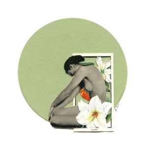 A woman sitting on the ground with her back to us.
