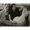 A man and woman sitting on the couch