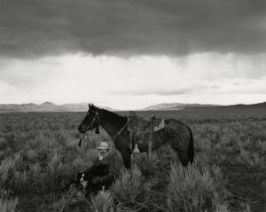 A man and his horse in the middle of nowhere.