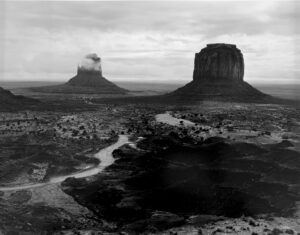 A black and white photo of two mountains