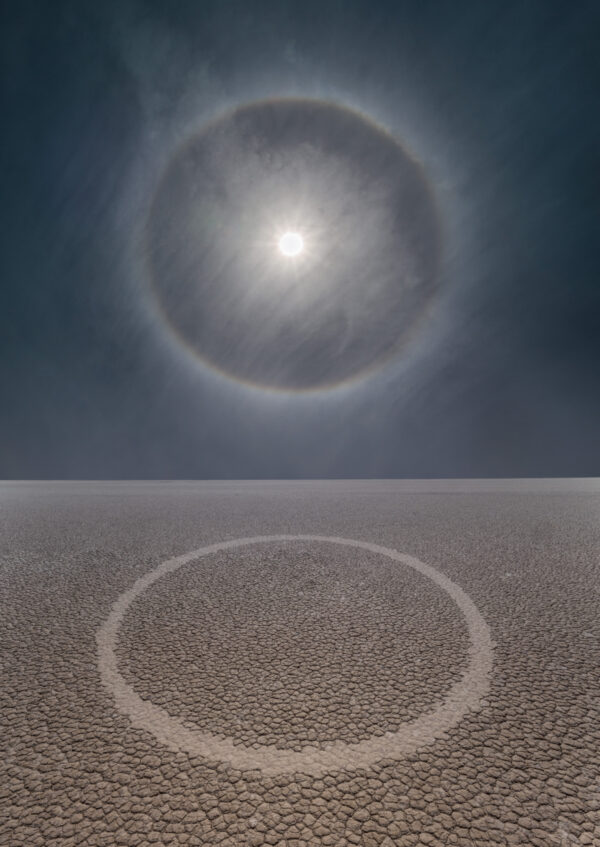A circular sun halo over the ground.