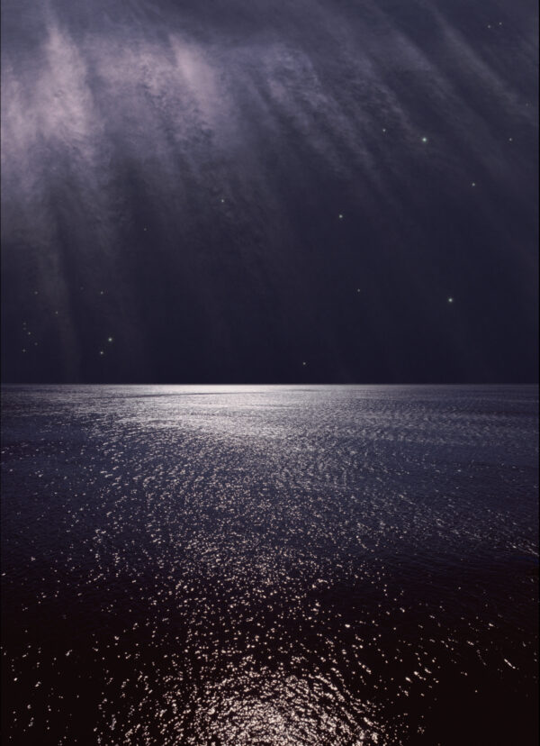 A dark night with the sun shining through.