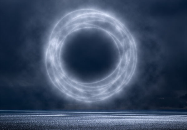 A black hole in the sky with some clouds