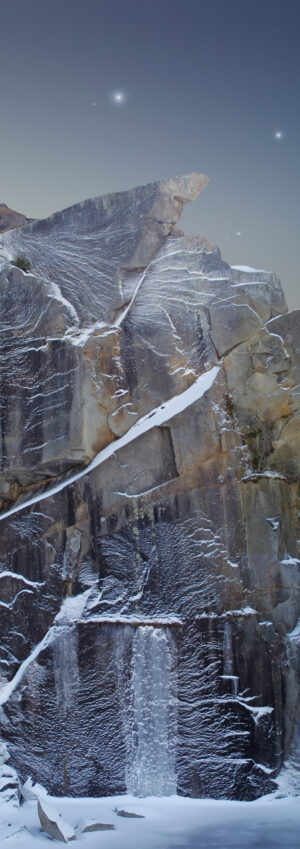 A close up of the side of a rock wall