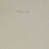 A close up of the back cover of an old book