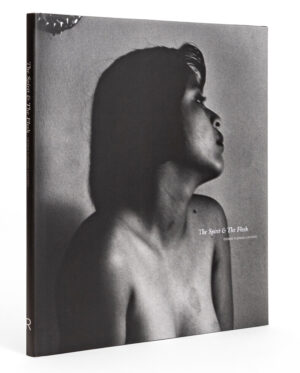 A black and white photo of a woman 's breast
