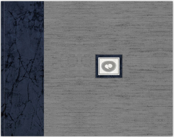 A gray and blue album with a picture of an animal.