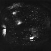 A black and white photo of the night sky.
