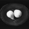 Two pears in a bowl on the table