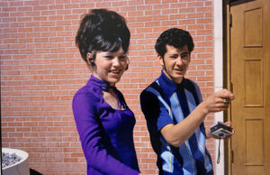 A woman and man standing next to each other.