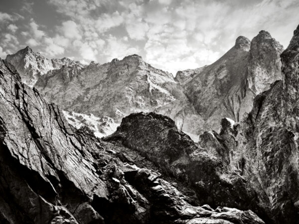 A black and white photo of some mountains