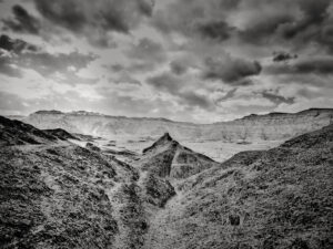 A black and white photo of some mountains